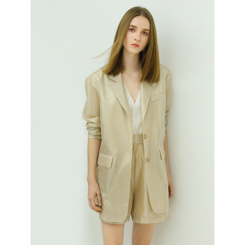 Blazer long beige doux et transparent à boutonnage simple
